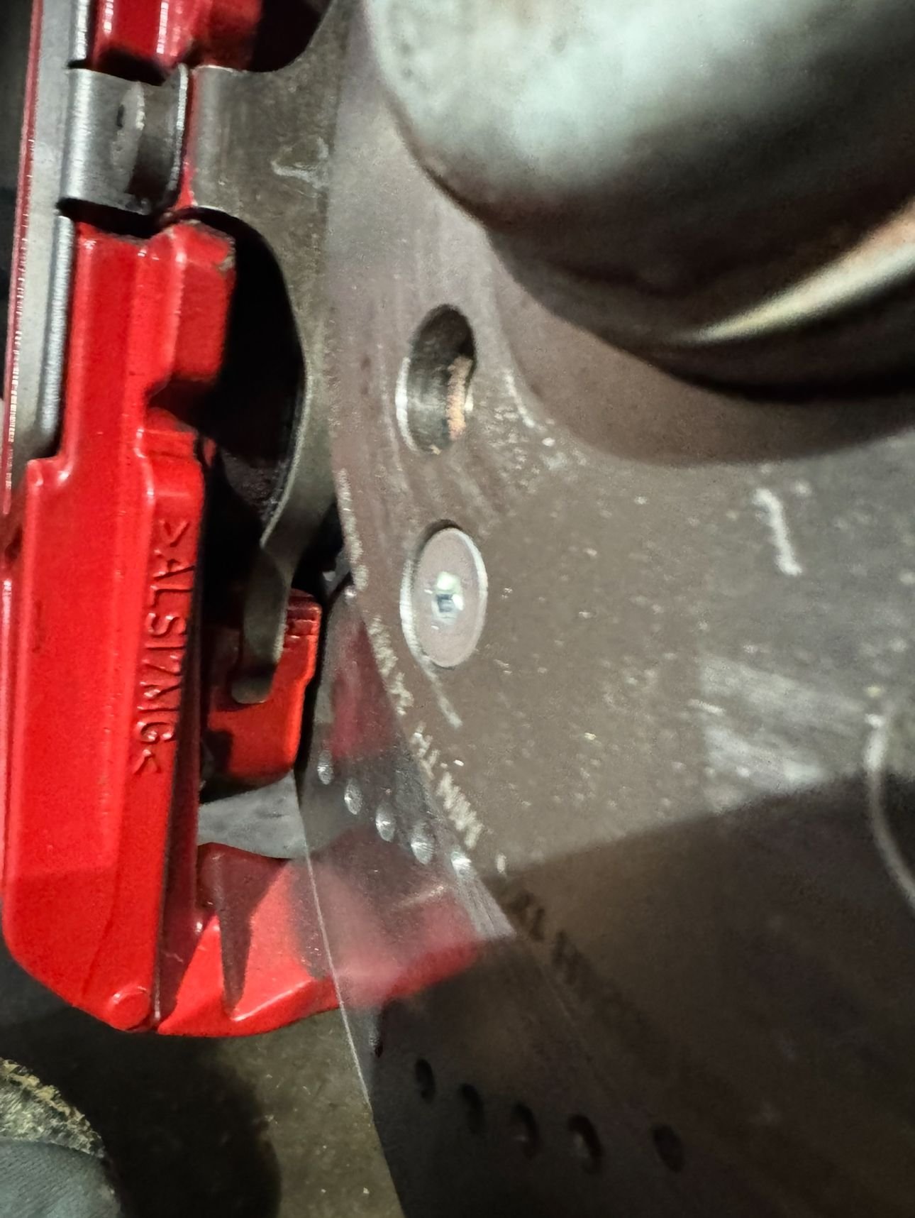 Bottom side of e550 w212 a07 caliper anti rattle clip