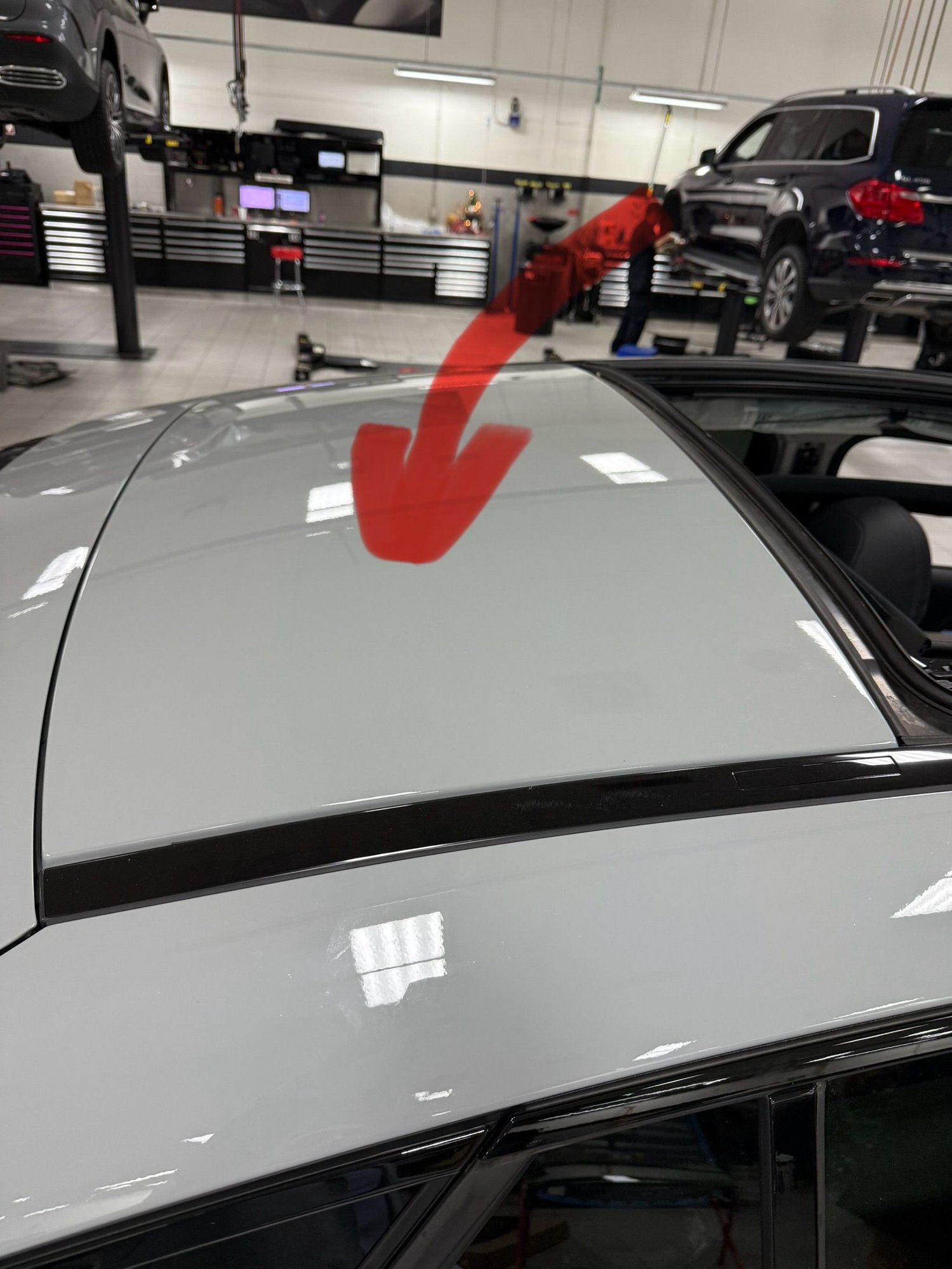 Rear roof piece being cut out and replaced.