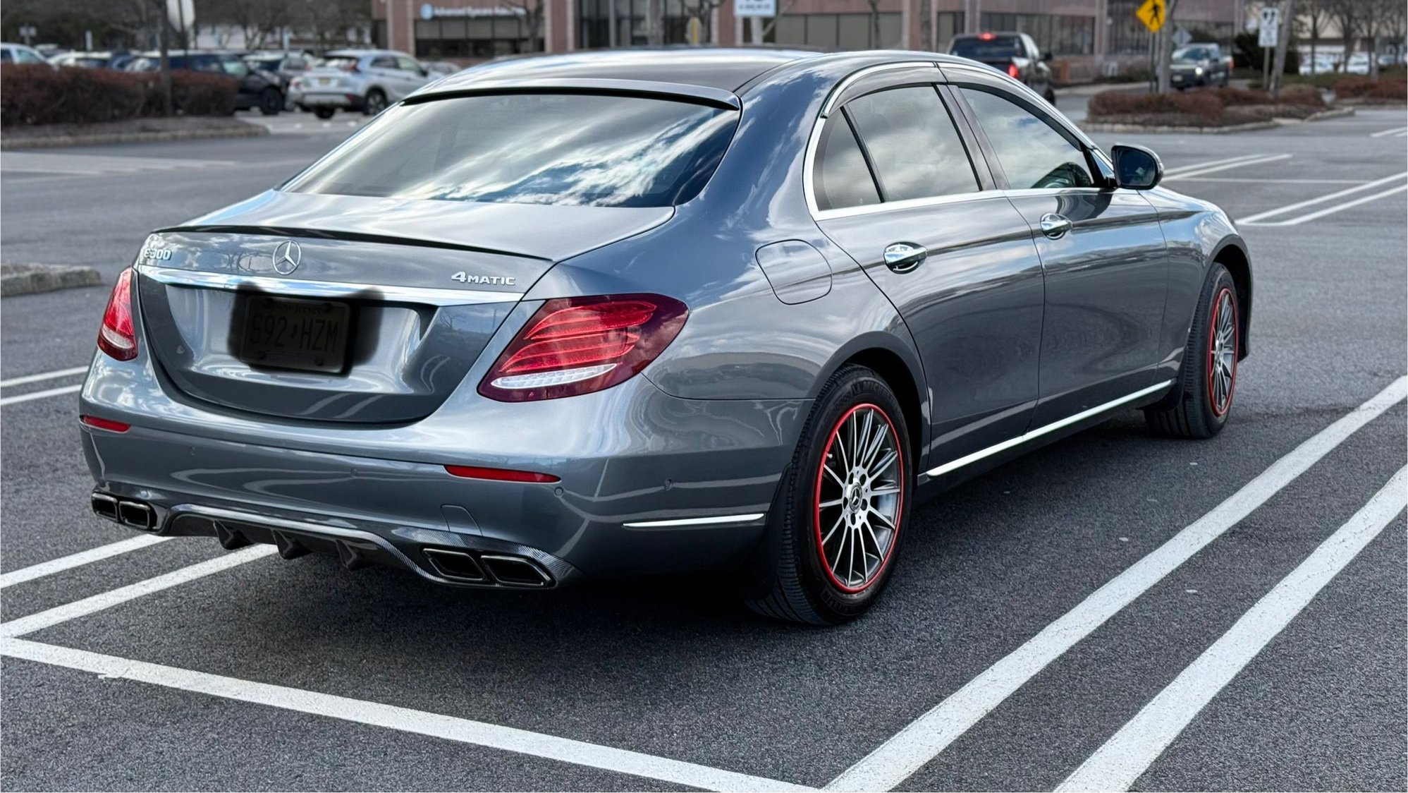 Carbon fiber look diffuser and black chrome pipes inside on Luxury/Exclusive model