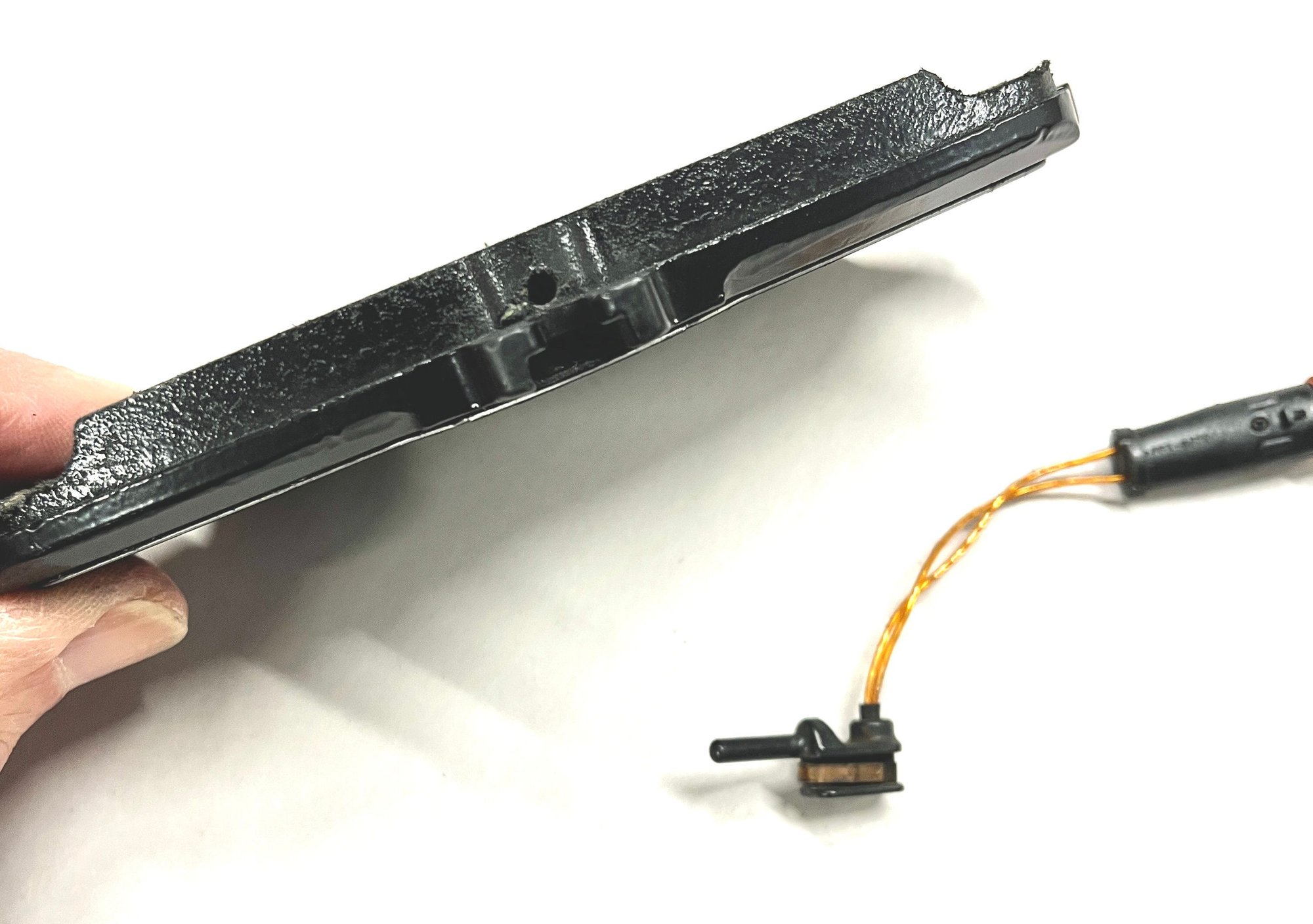 New condition EQS rear brake pad. 7.6mm thick friction material.