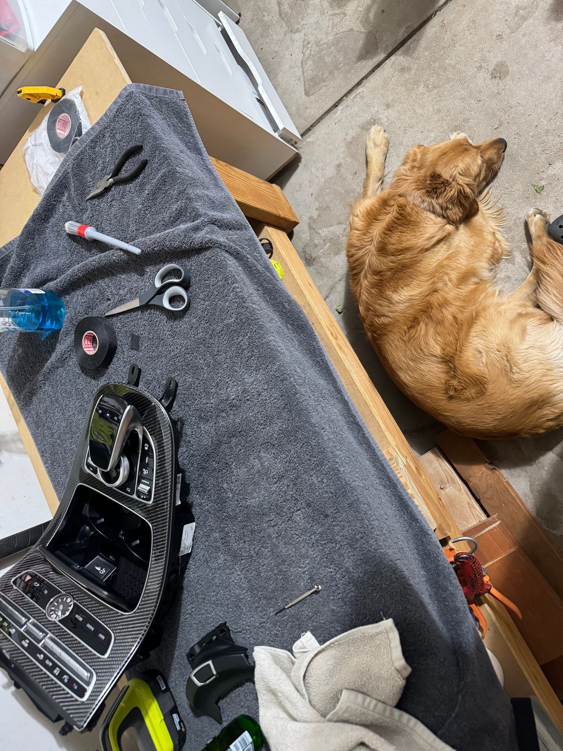 I put a layer of tesa tape between any two different plastic pieces that had even a remote possibility of coming in contact. The cupholders seemed to be a big source of noise. Even when clipped in, they sit pretty loose in their cavity. Lining every edge with tesa tape helped immensely.