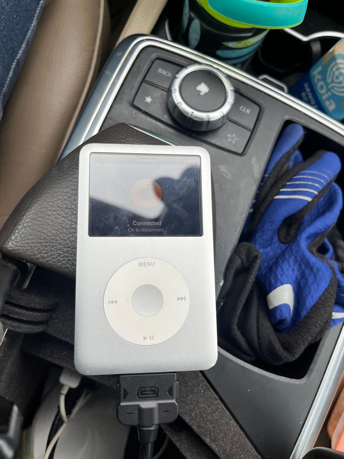 iPod Classic connected to center console via media interface cable.