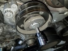 remove the supercharger tension pulley