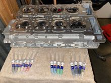 ( I only used 350/450/700/1000 grit on my valves , if they fail the pressure test I will disassemble them & continue with the  1500/2000/3000/4000 grit . Let’s hope I don’t have to do that ….. 
grit sizes starting from left to right 
60,000 
30,000
15,000 
12,000
10,000
6,000
4,000
3,000
2,000
1,500
1000
700
450 
350