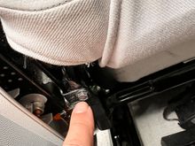To remove the airbag assembly,, there are two screws. One in the rear and one on the side near the seat bottom that you just detached a few steps above. It’s an 8mm screw. 