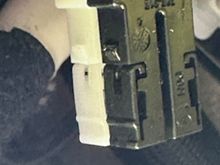 This is the plug you will swear at. I ended up using a pick next to the ridge to pull it out 