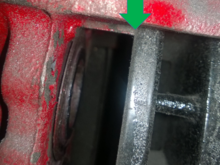 Pic2:  Rotor makes contact with little guiding flange lip on inside of caliper.  Would be really tough to get in there to machine.