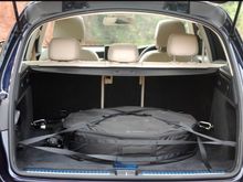 Wheel with bag in boot space