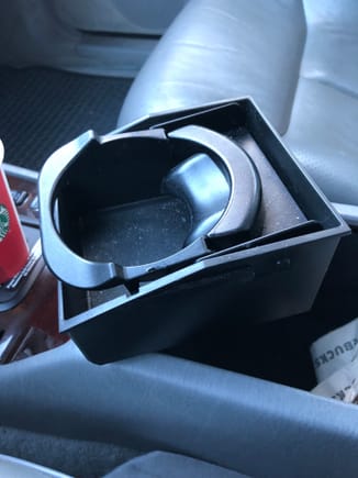 Cup holder lifted out of resting spot