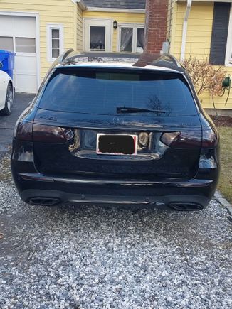 Stock rear spoiler and exhaust tips.