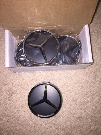 Black center caps for the wheels arrived today.  Will be popping these in tonight... 75mm, make sure you order the right size if you decide to swap yours with another cap.