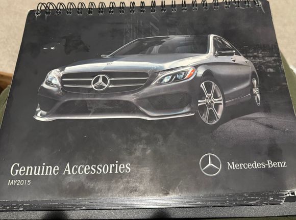 Does anyone have a part number for the luggage compartment net and a picture of it installed?

There is no knowledge about this part number from the net or the parts counter at Mercedes. 

Thanks in advance, & 
Happy Holidays,
Mike