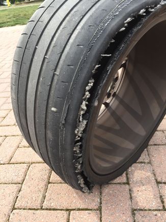 Here was my front passenger side.  

All my front and rear tires had excessive wear to the point of steel belts were showing.  