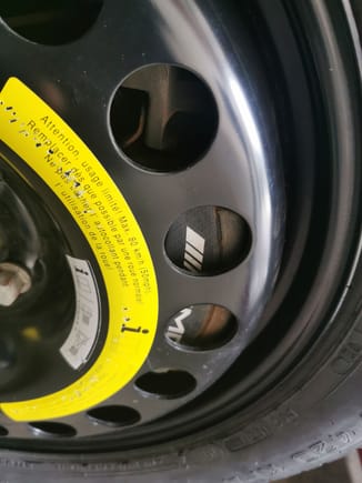 The spare tire rim just fit. Don't forget to add tire pressure to your spare tire