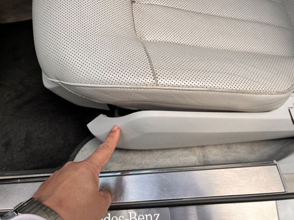 For some unknown reason my seat trim was detached from the frame. Have no idea how this happened but it might be a small crack that formed on the trim tab that slides over the seat frame tab. I am pointing to the trim piece. That small gap between the trim and seat bottom should not be there 