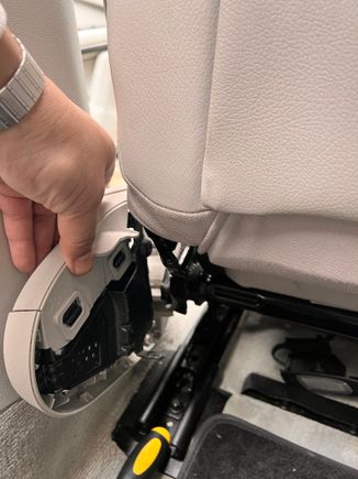Here’s me sliding the whole trim piece and airbag assembly off of the side of the seat. 