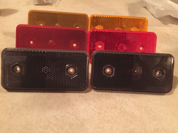 The left side in red and yellow have a layer of smoke plastidip that can be peeled off and removed. I was practicing.