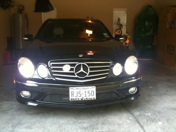 Baby sitting in the garage.