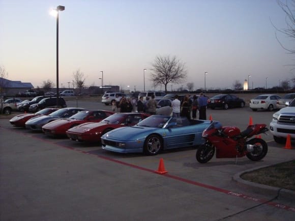 Notice that everyone is circled around the SMART car rather than the exotics... LOL