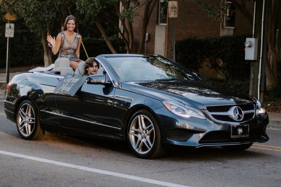 Thanks for giving me an excuse to post a picture of my E-cab.  Dark gray, gray leather.  Only downside is I was hit up for every parade in town.  This shot is me driving my daughter who was homecoming queen that year.  2018 I believe.  Thanks for allowing me to indulge...