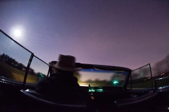 This shot was taken with a remote and a fisheye lens on a tripod in the back seat