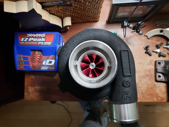 GTX2860R Gen2 with red anodized billet wheel. 