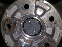 you see the cavities right beside stud holes? my understanding is that the extra portion of oem studs on which bolt on spacer is bolted should goto these cavities so that oem bolts dont hinder the wheel installation. my problem is, they dont. they hit the sides of the cavities and prevent wheel mount. 
could this problem be spacer specific? some other brand bolt on spacers should not have this issue? 
i will need 10 or 15mm spacer. if someone is using a small size bolt on spacers without issues?
