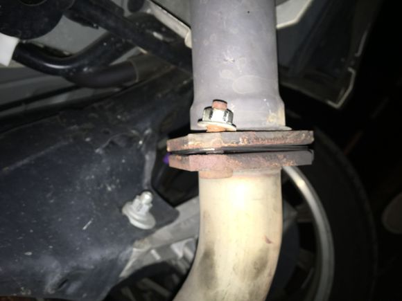 Bent exhaust bolt after struggling to get the rusted-on nut off.