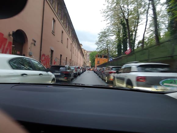 Trying to squeeze our huge Volvo wagon through the narrow streets of Bologna, Italy to get to our hotel.  The night we came in during Easter weekend there were thousands of people.  It was like Mardi Gras and the absolute last type of driving I wanted to do after driving all day, but we made it!