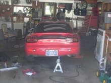 replacing the trailing arms and toe rods in the rear with the rx7store's drag launch kit