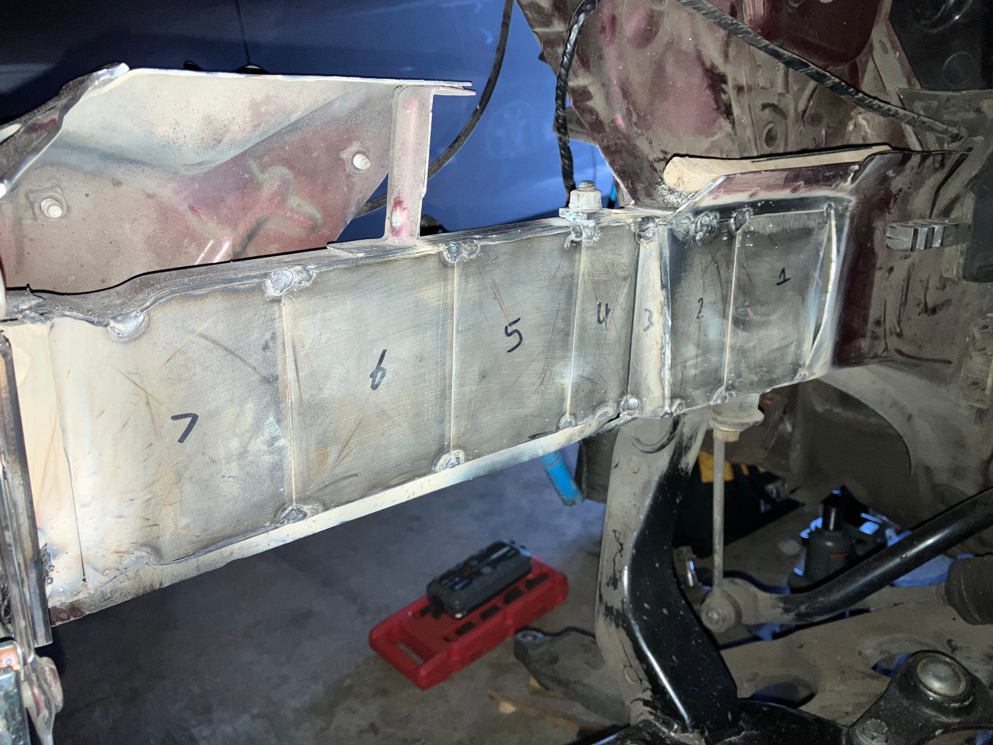 Then I tacked up the plates in place. Numbered from front to back