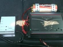 In-Car Entertainment Image 
Kicker Amp and Rockford Fosgate Capacitor