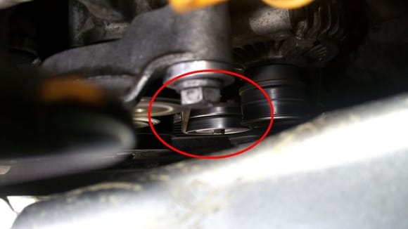 I paid closer attention to how the belt rode over the idler pulley. I'm not sure if it's normal for the belt to ride that close to the edge but the previous track/wear mark on the idler pulley indicates the position of the previous belt(s)