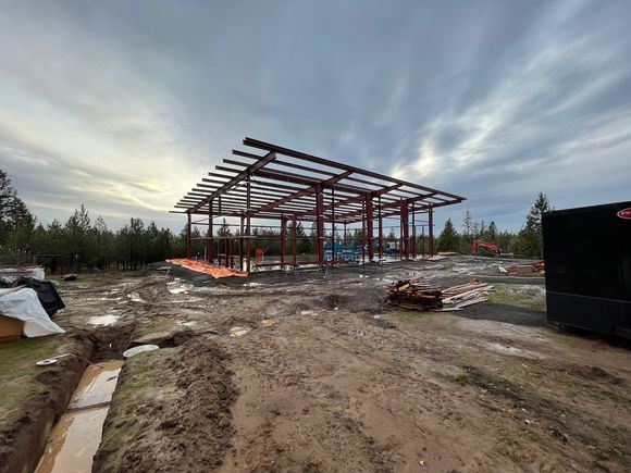 We are close to framing up the four window openings. There are two more above the one on this end. The overhangs of the roof easily add 50% of cost because they are labor intensive to erect, and add greatly to the structural loads.