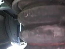 I cannot remember if this is the left rear jounce bumper or right rear jounce bumper on 2005 GMC Sierra 1500 VHO 6.0L