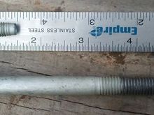 Power Steering bolt [larger] and the EXTRA BOLT