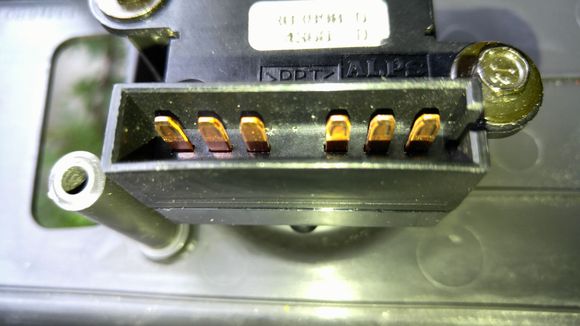 After I noticed that these connector pins for the lumbar connection showed less corrosion, I realized the connector pins for the horizontal movement of the switch and circuit board needed cleaning
