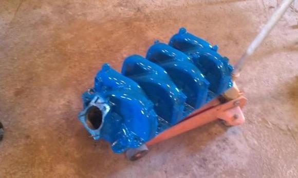 new marine intake ported/polished and painted.. i hate black and chevy orange doesnt impress me