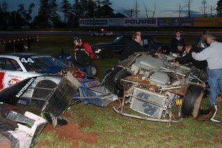 This is after flipping nose first 3 times in the in-field before resting on it's roof, actually the roof was gone it was just roll cage and grass at that point. The driver was a friend who raced in the series above this, took the car out and ended up getting picked up in a wreck, that, well, my car got the worst of. Driver was fine, thanks to proper race gear safety equipment, a hans device is a must, unless you want to hot rod your wheelchair.