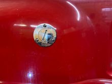 Here is the fuel dood on the drivers side rear fender.
I am thinking about using the origional side door for a methanol tank.  ??!