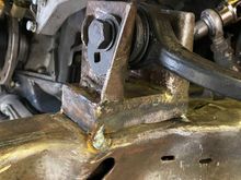 I have raised the upper A-arm mounts about 1 1/4" to stabilize the camber changes, in the range I am working with. The truck is lowered 3". I bought springs for the front to lower it. Yet retain a nice ride quality.
The rear came down a little over 3", by using the Explorer rear end, (with spring perches on the bottom of the axle tube).