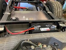 Running battery cables.
Added a secondary layer of hose, (to prevent wear on battery cable. Sparks and gas tank might NOT work out too well !!