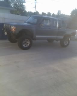 92 4.0 4x4 with locker, roll cage, bumpers,6" skyjacker, and the whole deal. crashed.