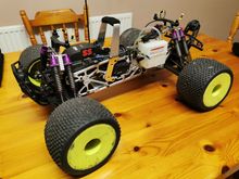 Throttle servo side. Note sliders and bend in the linkage and brake lever arm. 