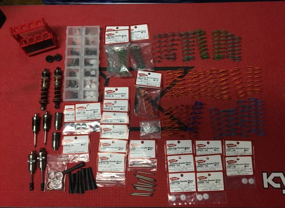Shock parts- complete set front and rear shocks, complete 50mm front shock and extra new bodies, springs, pistons, boots, seals, shock caps, rebuild kits..