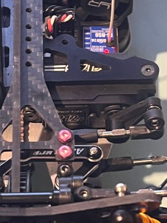Full right turn, notice the gap between the steering rack and the bulkhead (look at the black screw)