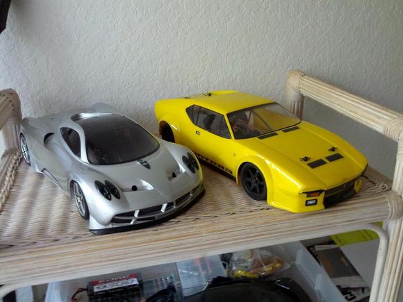 Pantera is the prettier car now.  Huayra awaits its lighting system and is sitting on the Nikko's old chassis for display.