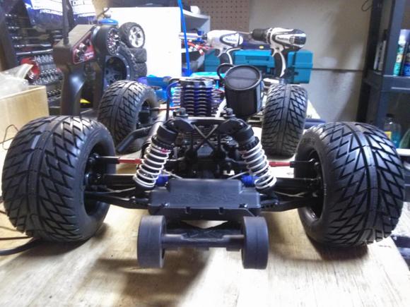 Aluminium wheels/rubber tires for the wheelie bar from traxxas work great for long,stable wheelies.