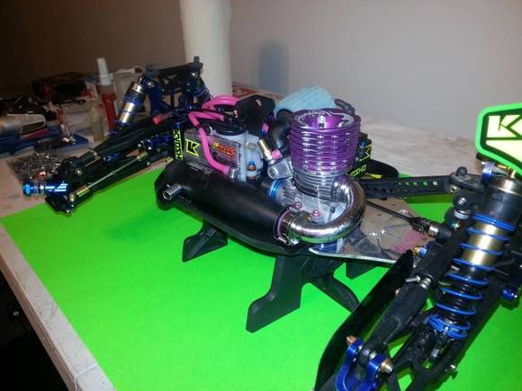 full machine polished bce, hand wet sanded (to strip blue anodize off sections of the king headz, fioroni, and the stock towers), and then polish to a mirror, ebmods 2041 pipe, velvet shock bodies, fioroni spring bottoms, hand made brass rod end sleeves, losi 4 shoe clutch, team sidewinder xzb with a couple ebmod parts, ring gears all hand ground for lightening (13g per ring gear), hotbodies lightweight outdrives and internal diff crosspins, many packages of ofna gold washers and a few special ordered pink, the list is too long and couldnt venture to guess on man hours