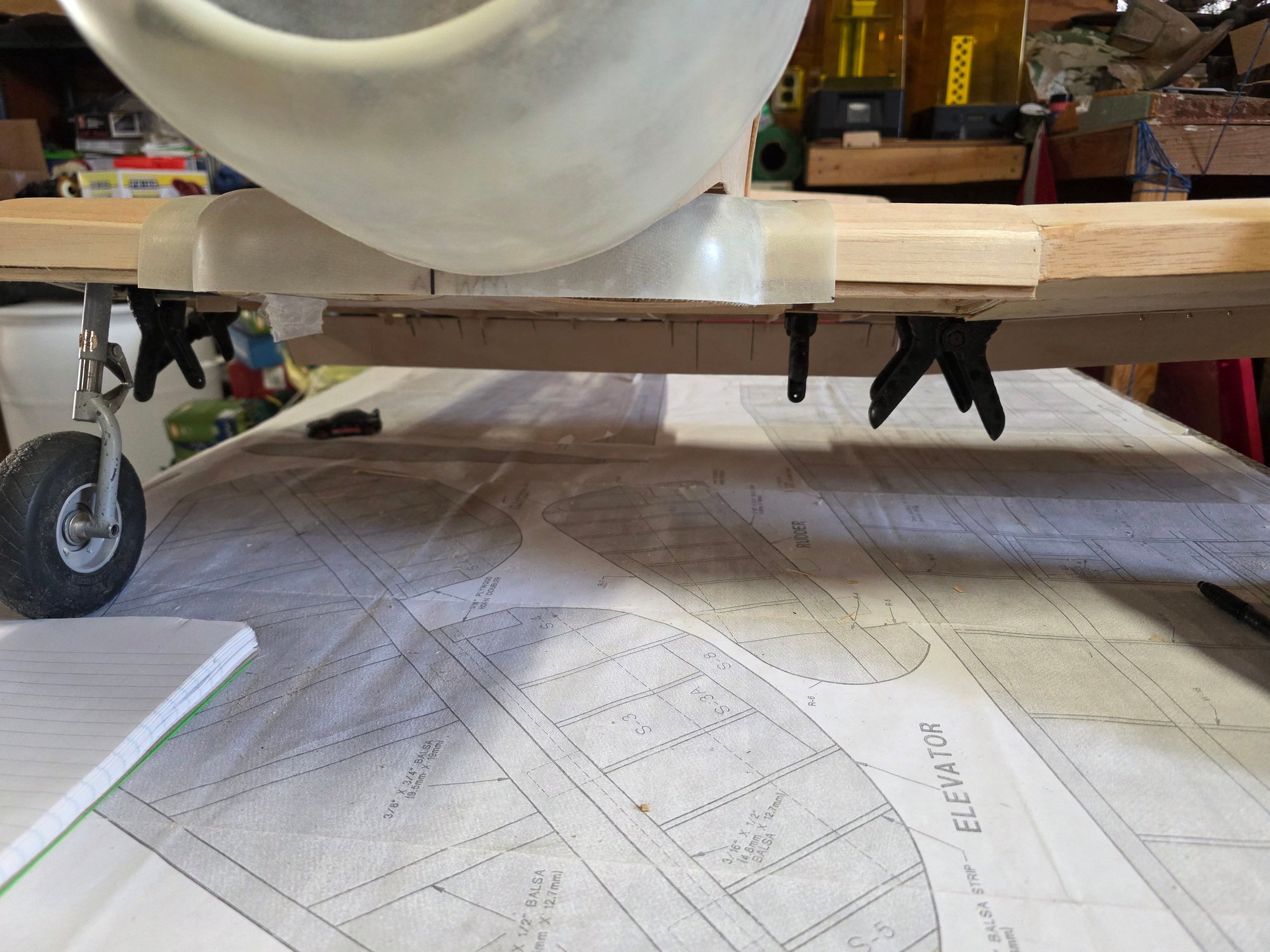 Still searching for the left main retract. You can see the flaps dropping underneath